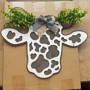 Rustic Cow Wall Decor with Greenery and Bow